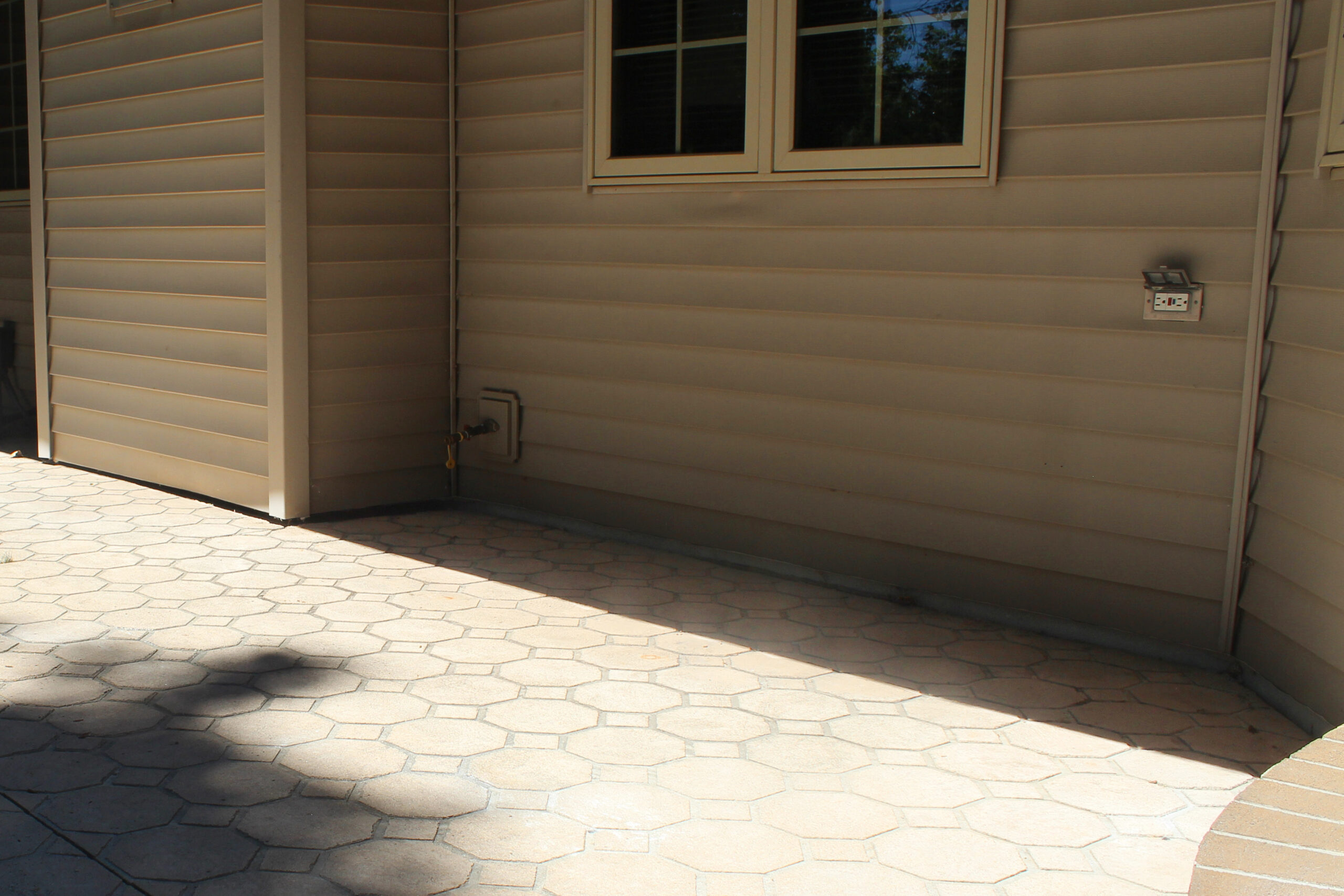 After backyard patio concrete lifting project