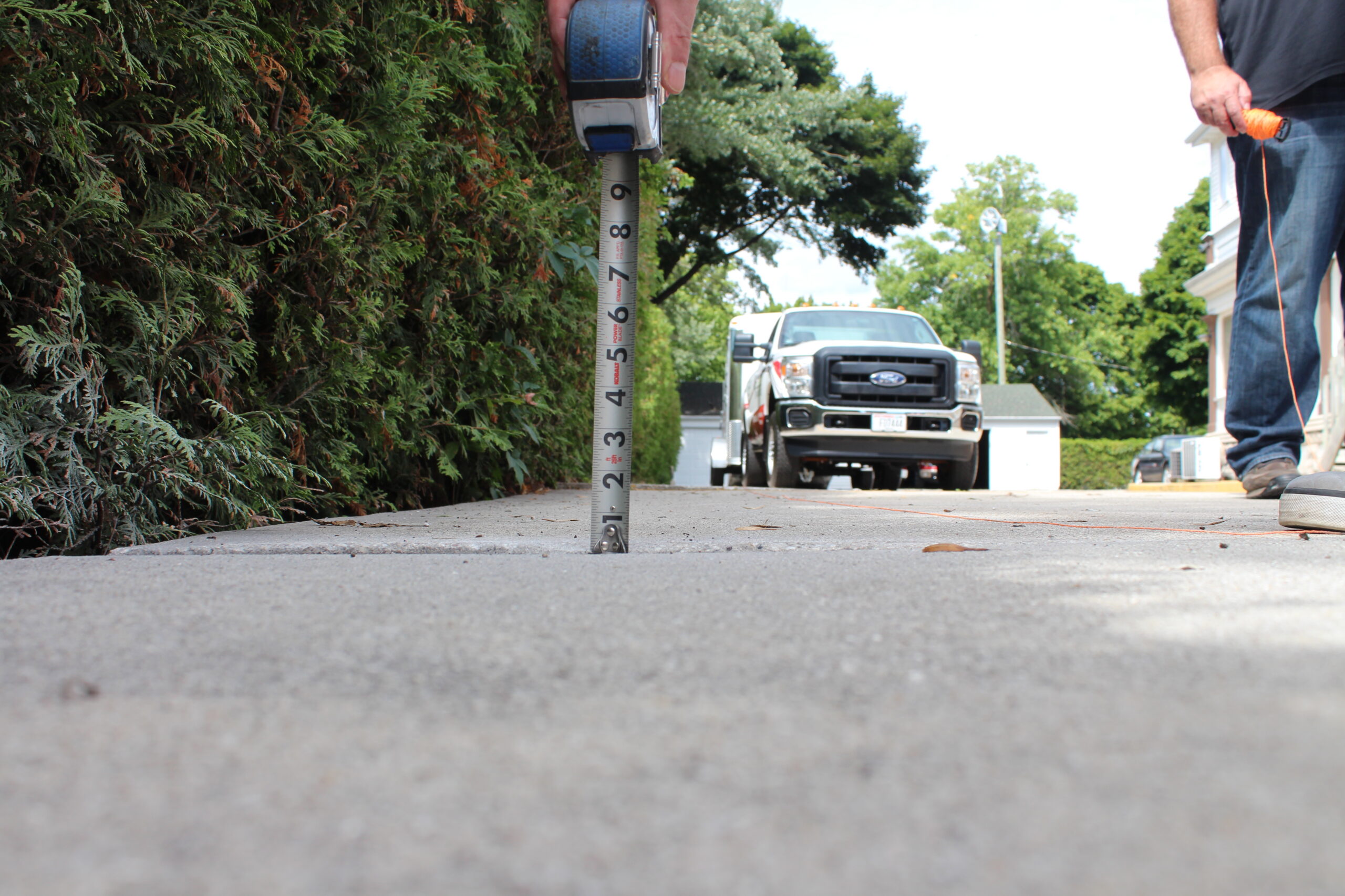 After residential driveway concrete lifting project
